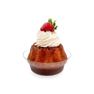 Image of a single serving of French baba au rhum dessert. Pierre and Michel your authentic French bakery