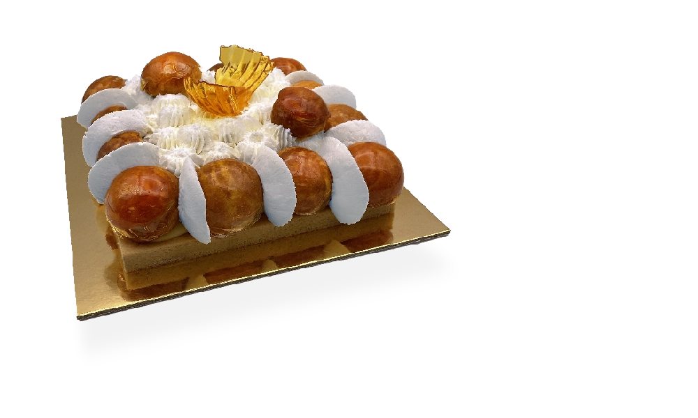 A stunning French Saint Honoré cake with layers of puff pastry, cream puffs, caramelized sugar, and a decadent whipped cream topping.