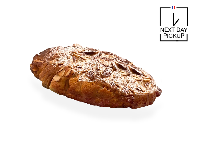 Image of a single French almond croissant. Pierre and Michel your authentic French bakery