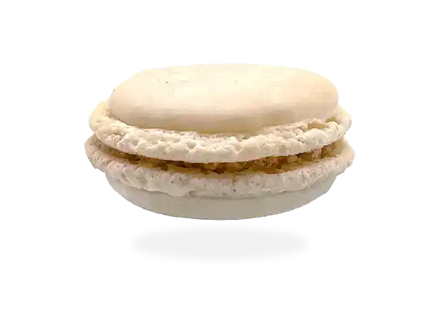 French vanilla macaron with a creamy vanilla filling, beautifully crafted with precision by Pierre and Michel your authentic French bakery.