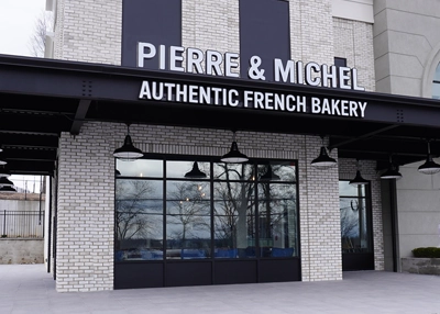 A beautifully arranged assortment of French pastries, viennoiseries, and birthday cakes at the New Pierre and Michel Authentic French Bakery in Upper Saddle River, New Jersey.