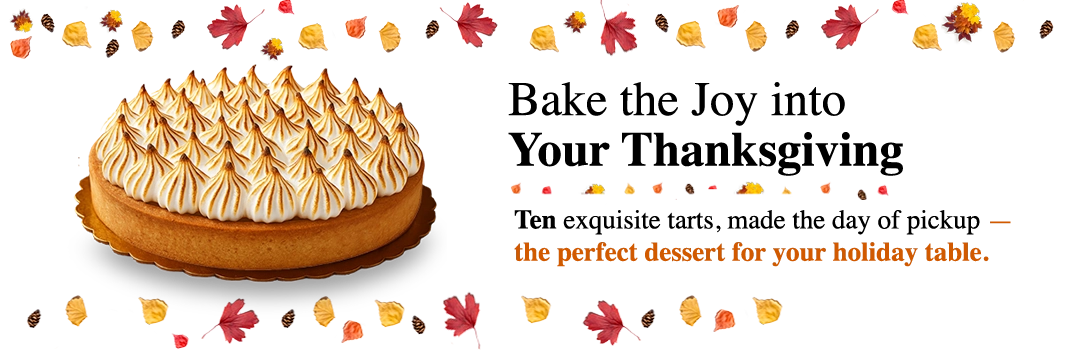 Freshly baked Thanksgiving tarts from Pierre and Michel, made in-house on the day of pickup, surrounded by festive Thanksgiving decor.